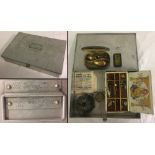 1906 - 1935 sirrum sandwich box with 1800's reel (no handle) plus other period fishing pieces.