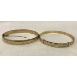 2 rolled gold vintage bracelets.