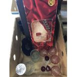 A box of assorted clear and coloured glass ware items.