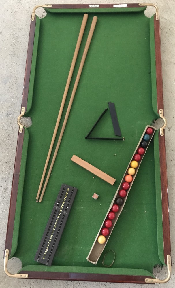 A vintage boxed Joe Davis table top snooker table and accessories.