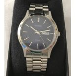 A boxed men's Sekonda wristwatch with stainless steel strap.