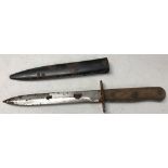 A German WWI pattern wooden handled boot knife with sheath.