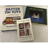 3 reference books on toys & dolls.