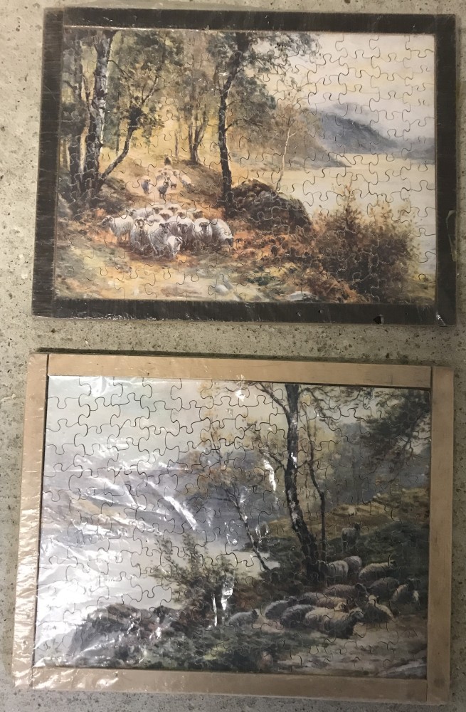 2 vintage wooden jigsaw puzzles depicting rural scenes with sheep.