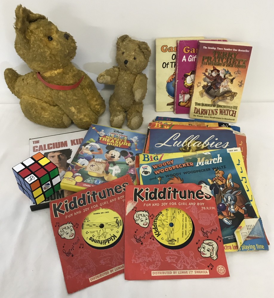 A box of assorted vintage toys to include teddies, books and Spongebob Squarepants figures.