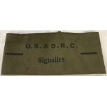 A WWII pattern US and d.r.c Signaller arm band.