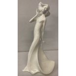 A Royal Doulton Figurine from the Images range, " Carefree".