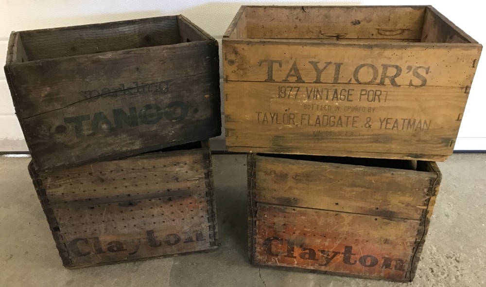 4 vintage wooden advertising crates.
