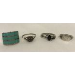 4 silver ladies dress rings.