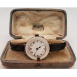 A vintage ladies mechanical watch with a polished mother of pearl case.