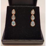 A pair of 9ct gold drop earrings.