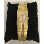 A ladies gold tone quartz wristwatch by Eternity.