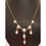 A heavy 925 silver necklace set with freshwater pearls.