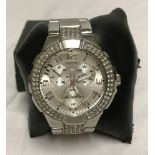Guess watch set with crystals around the dial.