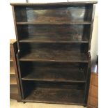 A vintage dark oak solid wood 5 shelf bookcase.