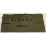 A WWII pattern U.S. and D.R.C Signaller arm band.