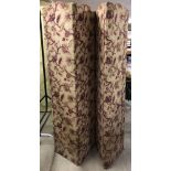 A vintage 4 fold fabric screen with red floral design to fabric.