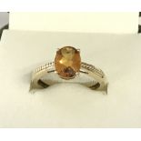 A 9ct gold dress ring set with a 1.7ct Madeira citrine.