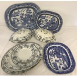 A box of assorted blue and white ceramics comprising 3 large Willow pattern meat plates