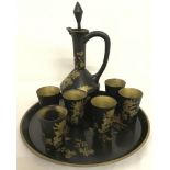 A black lacquer sake set, with flower decoration.