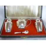 A good quality silver three-piece cruet