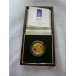 A 1996 gold proof sovereign, cased with