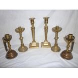 Three pairs of old brass candlesticks in