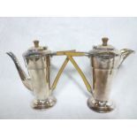 A pair of Art Deco silver plated cafe au