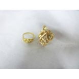 A 14ct gold dress ring with rustic mount