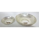 A pair of silver circular graduated serv