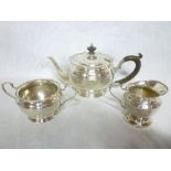 A George V silver three-piece teaset com