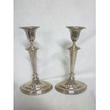 A pair of late Victorian silver tapered