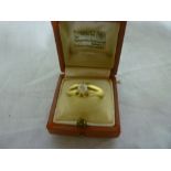 A 9ct gold dress ring set diamond