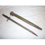 A First War American Remington bayonet dated 1913 in leather scabbard with suspension dated 1917