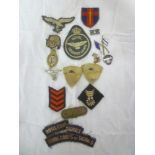 An original Second War German woven Luftwaffe badge, printed skull badge,