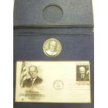 A 1969 Dwight D Eisenhower commemorative medallion and first day of issue cover in presentation