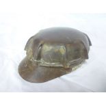 An old fibre miners peaked helmet