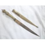 An Eastern dagger with 7" single edged blade,