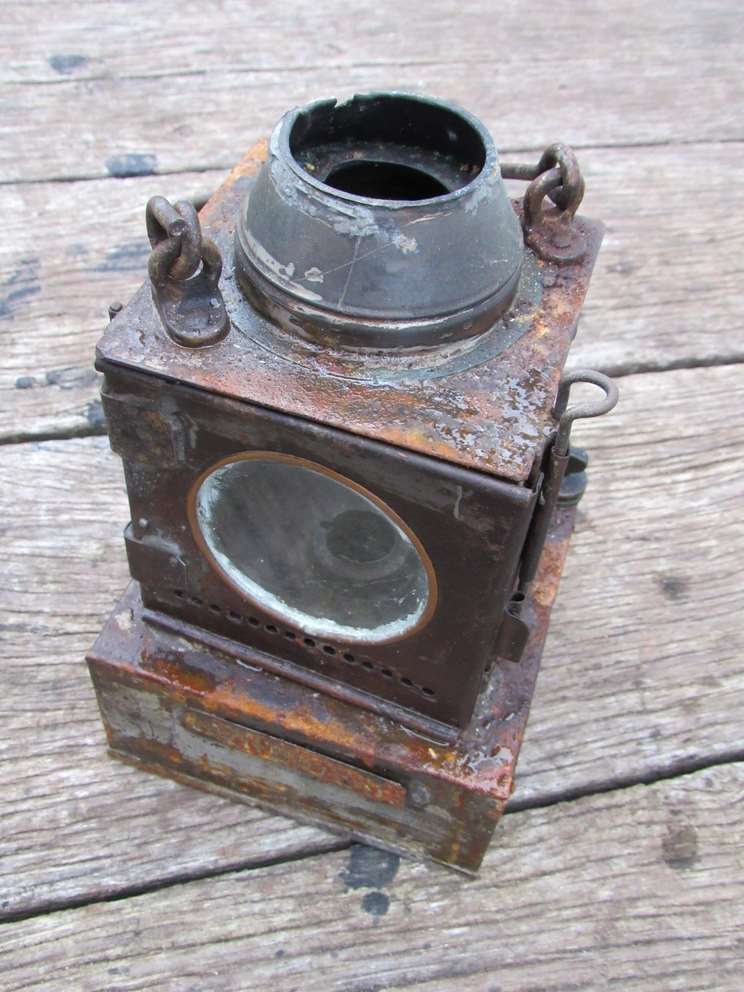 A railway signal lamp interior, with reservoir, no burner,