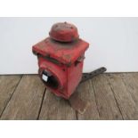 An LNER red painted railway signal lamp case