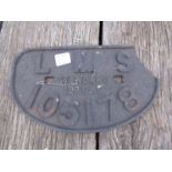An LMS railway wagon plate stamped 105178 (a/f)