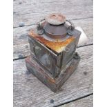 An LNER railway signal lamp interior with reservoir and burner,