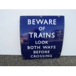 A B.R (E) enamel crossing sign "BEWARE OF TRAINS LOOK BOTH WAYS BEFORE CROSSING", 69cm x 77cm