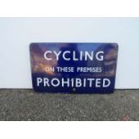 A B.R (E) enamel Station sign "CYCLING ON THESE PREMISES PROHIBITED", fully flanged, 76cm x 45.