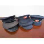 Five various British Railways hats to include two with silver on red sew-on double arrow,