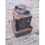 An LNER railway signal lamp interior, with reservoir,