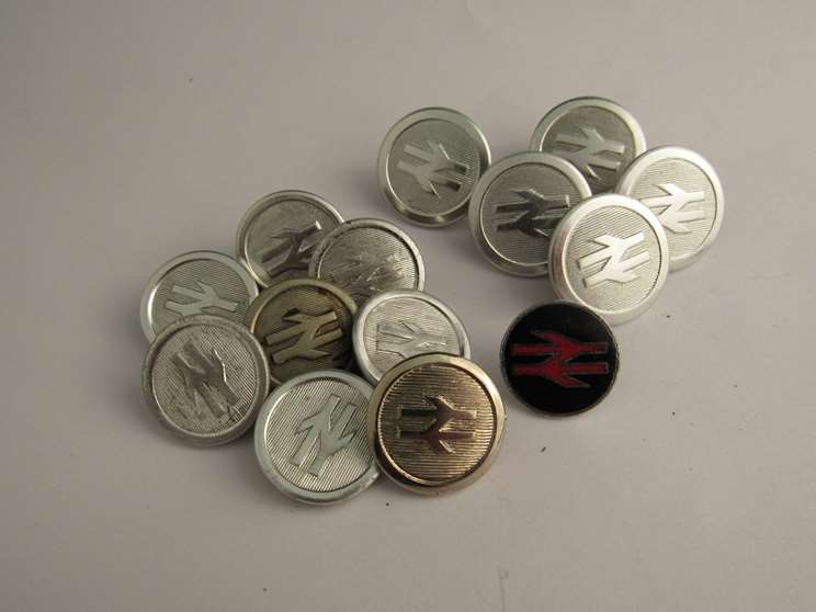 A quantity of variously sized British Rail double arrow buttons