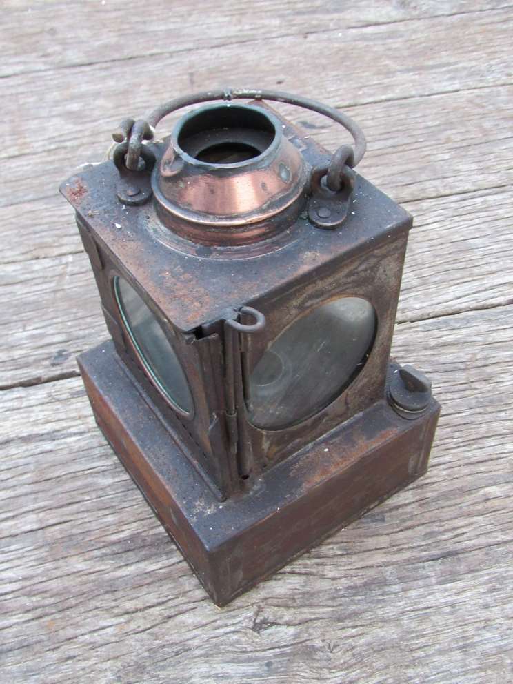 An LNER railway signal lamp interior with reservoir,