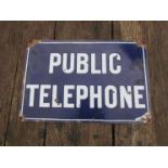 An enamelled "PUBLIC TELEPHONE" sign. 45.5 x 30cm