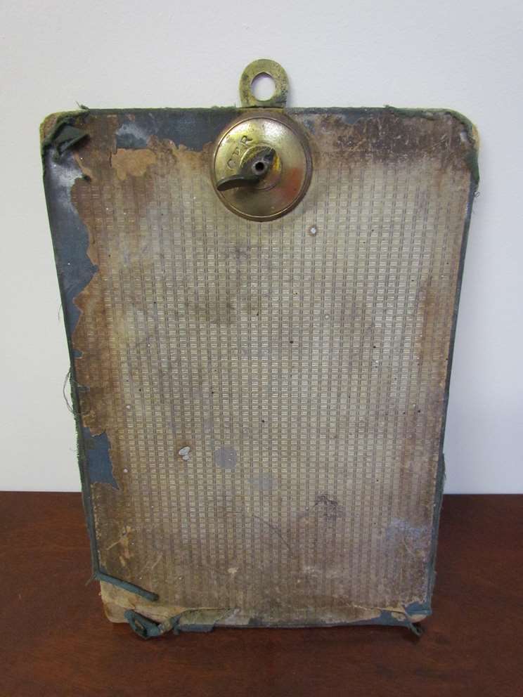 A GER clipboard with brass fastening